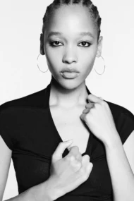 Model wearing thin minimalist hoop earrings from ZincOccasions